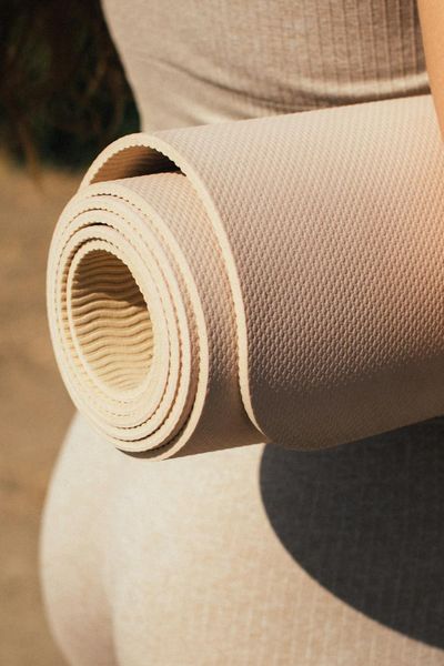 Close up of a yoga mat texture in graphite color.